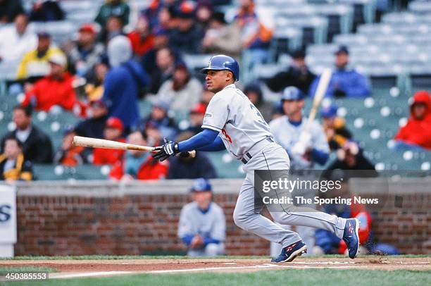 Cesar Izturis of the Los Angeles Dodgers bats against the Chicago Cubs at Wrigley Field on April 28, 2002 in Chicago, Illinois.