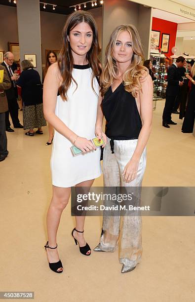 Cressida Bonas and guest attend the Art Antiques London Gala Evening in aid of Children In Crisis at Kensington Gardens on June 10, 2014 in London,...