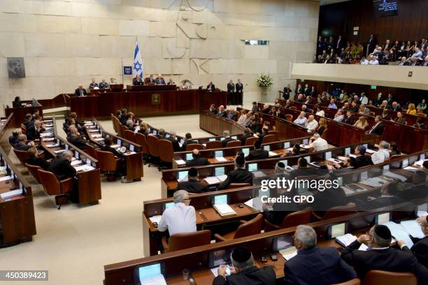 In this handout provided by the GPO, French President Francois Hollande attends a meeting of the Knesset on November 18, 2013 in Jerusalem, Israel....