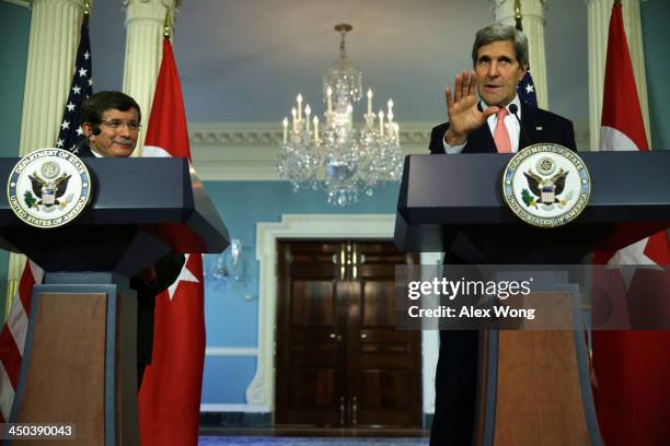 Secretary of State John Kerry and Turkish Foreign Minister Ahmet Davutoglu participate in a joint press availability November 18, 2013 at the State...