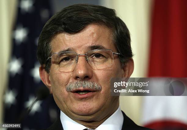 Turkish Foreign Minister Ahmet Davutoglu speaks during a joint press availability with U.S. Secretary of State John Kerry November 18, 2013 at the...