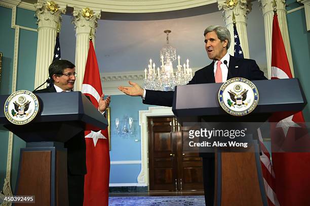 Secretary of State John Kerry and Turkish Foreign Minister Ahmet Davutoglu participate in a joint press availability November 18, 2013 at the State...