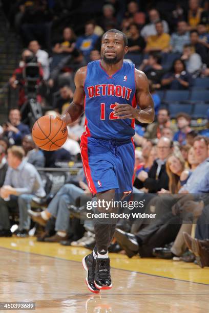 Will Bynum of the Detroit Pistons brings the ball up the court against the Golden State Warriors on November 12, 2013 at Oracle Arena in Oakland,...