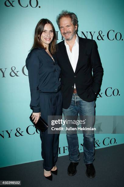 Geraldine Pailhas and Christopher Thompson attend the Tiffany & Co Flagship Opening on the Champs Elysee on June 10, 2014 in Paris, France.