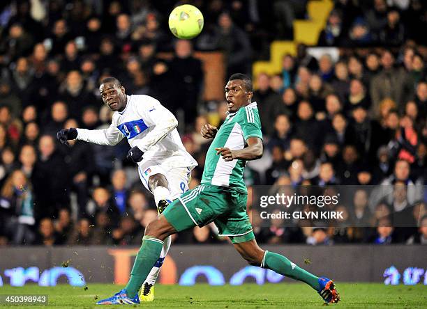 Italy's striker Mario Balotelli vies with Nigeria's defender Azubuike Egwuekwe during the International friendly football match between Italy and...