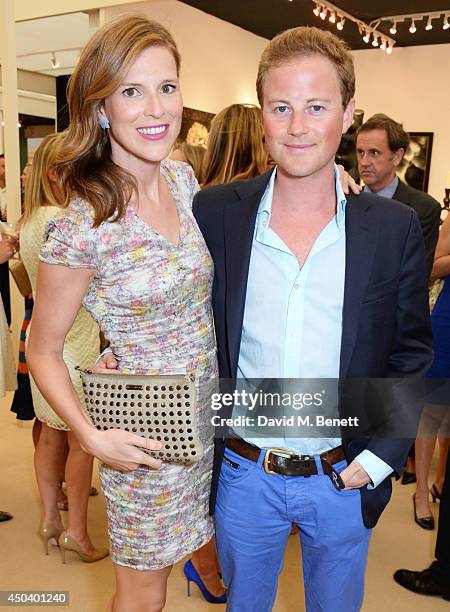 Guy Pelly and wife Lizzy Wilson attend the Art Antiques London Gala Evening in aid of Children In Crisis at Kensington Gardens on June 10, 2014 in...