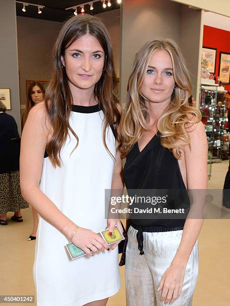 Cressida Bonas and guest attend the Art Antiques London Gala Evening in aid of Children In Crisis at Kensington Gardens on June 10, 2014 in London,...