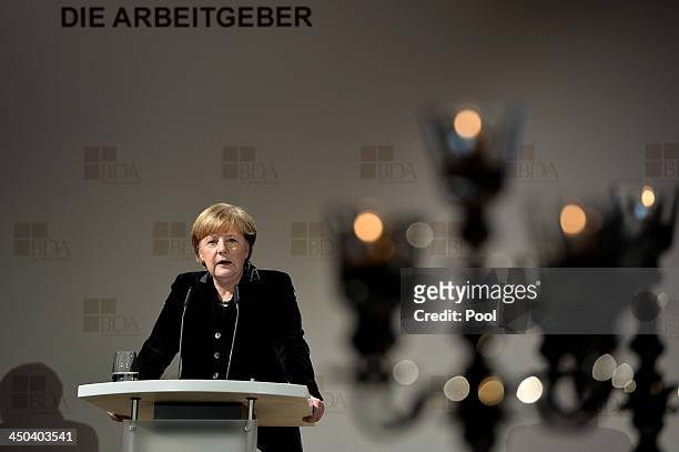 German Chancellor Angela Merkel speaks at a gathering of the German Employers' Federation at The German Historical Museum on November 18, 2013 in...