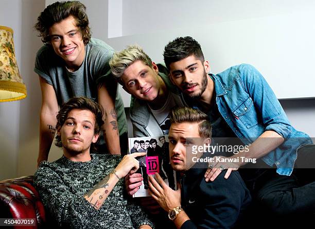 Zayn Malik, Liam Payne, Louis Tomlinson, Niall Horan and Harry Styles from One Direction pose as they attend the book signing of One Direction's new...