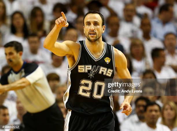 Manu Ginobili of the San Antonio Spurs reacts after hitting a shot against the Miami Heat during Game Three of the 2014 NBA Finals at American...