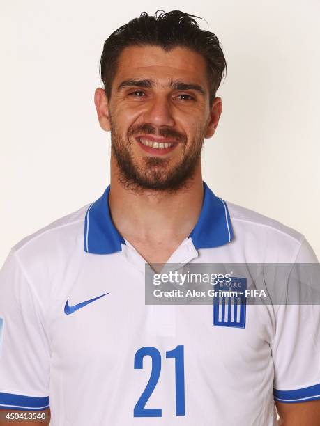 Konstantinos Katsouranis of Greece poses during the official FIFA World Cup 2014 portrait session on June 10, 2014 in Aracaju, Brazil.