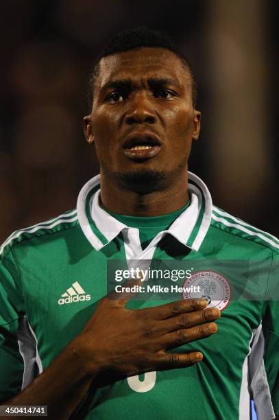 Azubuike Egwuekwe of Nigeria lines up for the National Anthem during an International Friendly match between Italy and Nigeria at Craven Cottage on...
