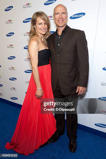 Kim Clark and Mark Messier attend the 13th Annual Samsung Hope For Children Gala at Cipriani Wall Street on June 10, 2014 in New York City.