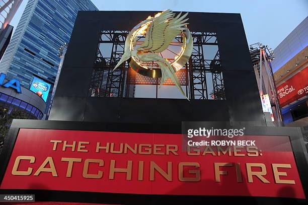 The flaming logo for the Los Angeles premiere of "The Hunger Games: Catching Fire" is seen at the Nokia Theatre LA Live in Los Angeles, California,...