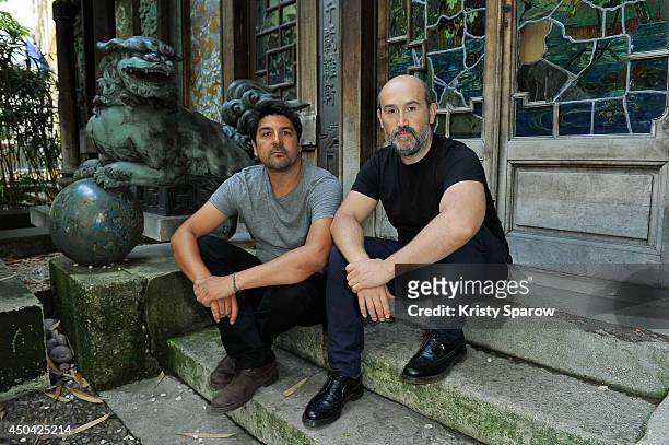 Cesc Gay and Javier Camara pose during the 'Una Pistola En Cada Mano' Paris Photocall at Cinema La Pagode on June 11, 2014 in Paris, France.