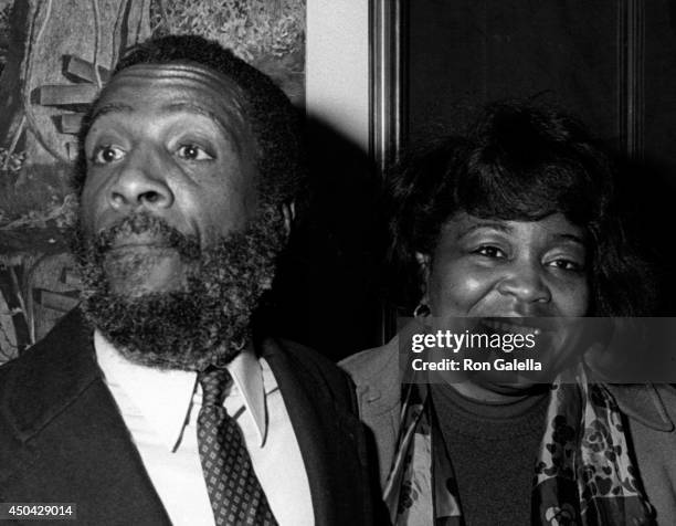 Dick Gregory and Betty Shabazz attend John Denver Photo Exhibit on December 1, 1980 at Hammer Galleries in New York City.