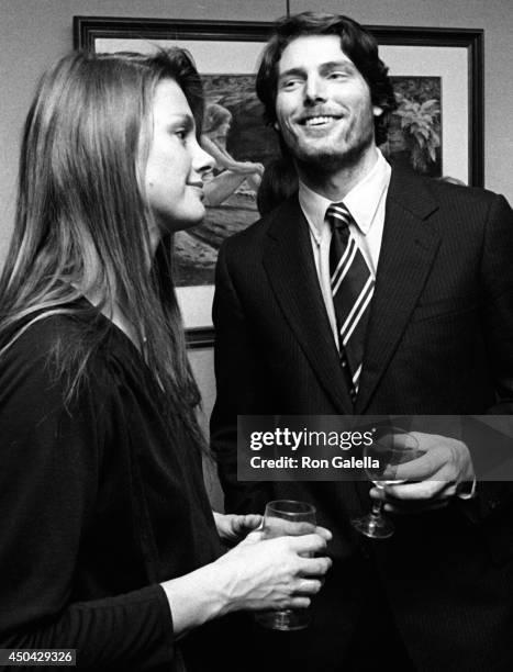 Christopher Reeve and Gae Exton attend John Denver Photo Exhibit on December 1, 1980 at Hammer Galleries in New York City.