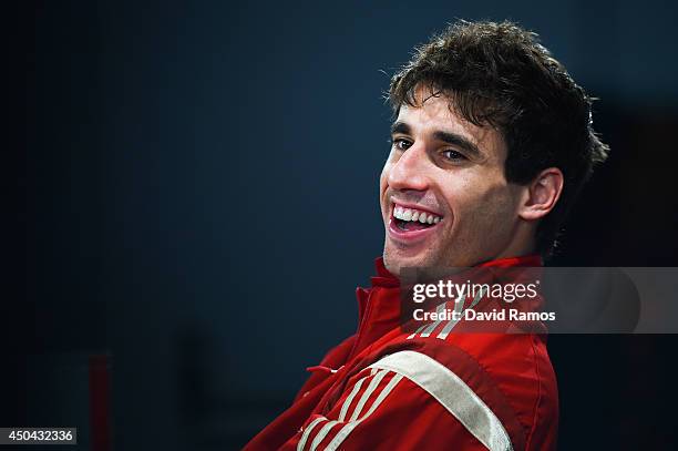 Javi Martinez of Spain faces the media during a Spain press conference at Centro de Entrenamiento do Caju on June 11, 2014 in Curitiba, Brazil.