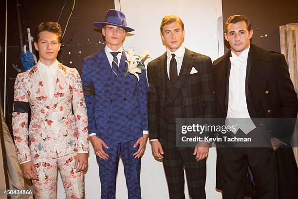 Models prepare backstage during the amfAR Inspiration Gala New York 2014 at The Plaza Hotel on June 10, 2014 in New York City.