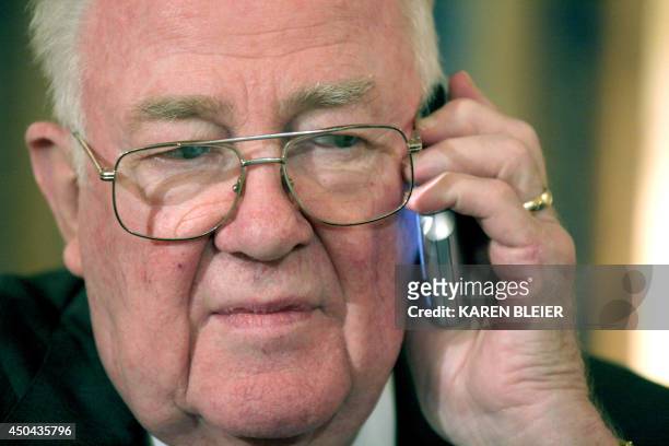 Former US Attorney General Edwin Meese III, member of the National War Powers Commission listens during a phone call prior to a press conference on...