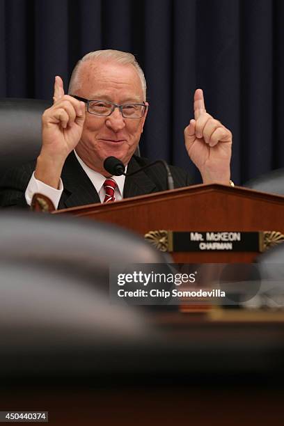 House Armed Services Committee Chairman Buck McKeon questions U.S. Defense Secretary Chuck Hagel about the about the prisoner exchange that freed...