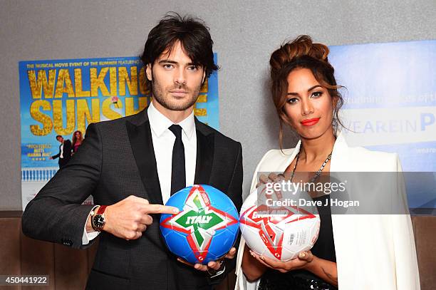 Giulio Corso and Leona Lewis attend the UK premiere of "Walking On Sunshine" at The Vue West End on June 11, 2014 in London, England.