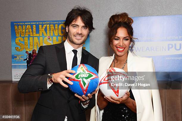 Giulio Corso and Leona Lewis attend the UK premiere of "Walking On Sunshine" at The Vue West End on June 11, 2014 in London, England.