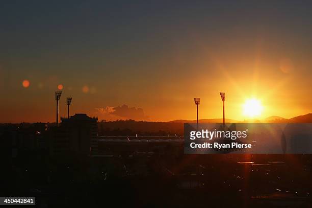 The sun rises over The Gabba before an Australia nets session at The Gabba on November 19, 2013 in Brisbane, Australia.