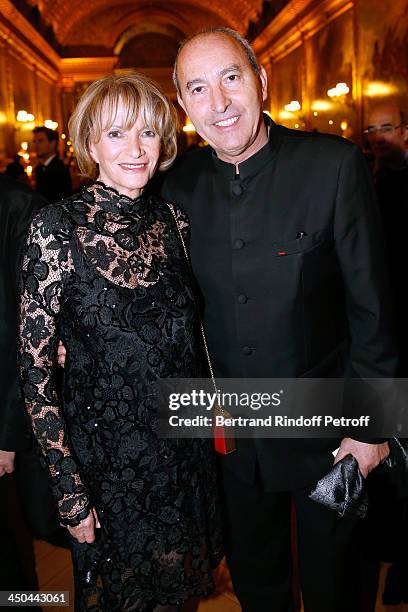 Eve Ruggieri and Contemporary artist Rachid Khimoune attend Pasteur-Weizmann Gala at Chateau de Versailles on November 18, 2013 in Versailles, France.