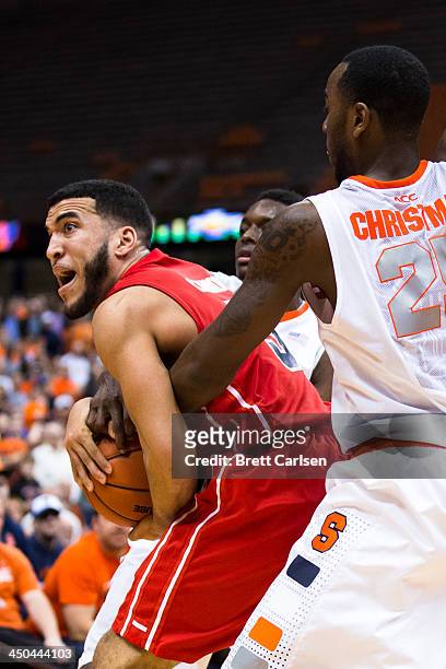 Jerami Grant and Rakeem Christmas of Syracuse Orange double team Jalen Cannon of St Francis Terriers on November 18, 2013 at the Carrier Dome in...