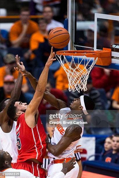 Fair of Syracuse Orange blocks a second half shot attempt by Jalen Cannon of St Francis Terriers on November 18, 2013 at the Carrier Dome in...