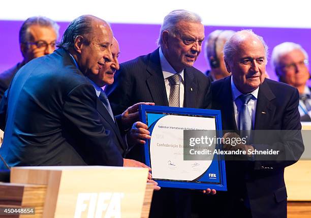 President of FIFA Joseph Blatter pay a tribute for the centenary of CBF with Marco Polo Del Nero, Eugenio Figueredo and Jose Maria Marin, during the...