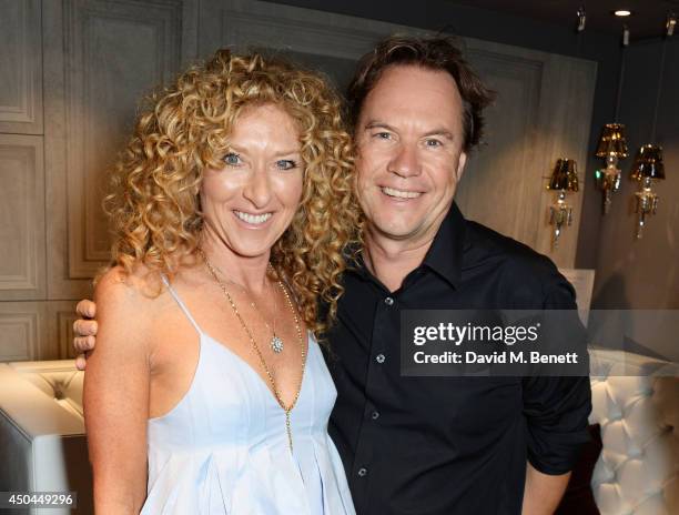 Kelly Hoppen and John Hitchcox attend the worldwide exclusive launch of YOO Home at Harrods on June 11, 2014 in London, England.