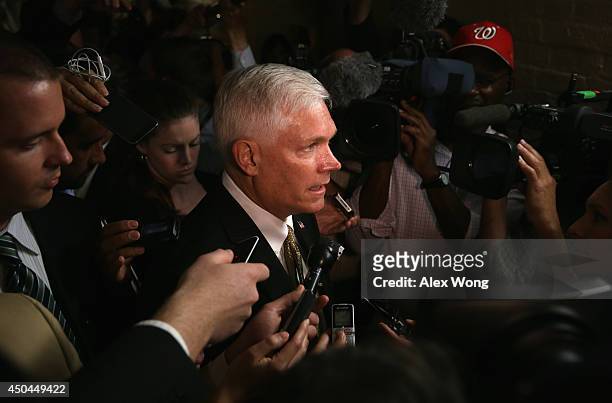 Rep. Pete Sessions is surrounded by members of the media as he arrives at a House Republican Conference meeting June 11, 2014 on Capitol Hill in...