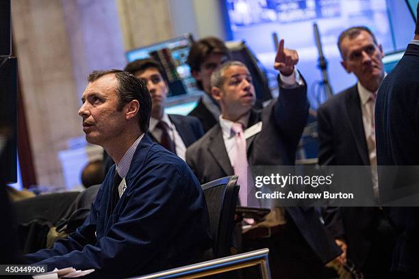 Traders work on the floor of the New York Stock Exchange during the afternoon of June 11, 2014 in New York City. After four days of gains, the Dow...