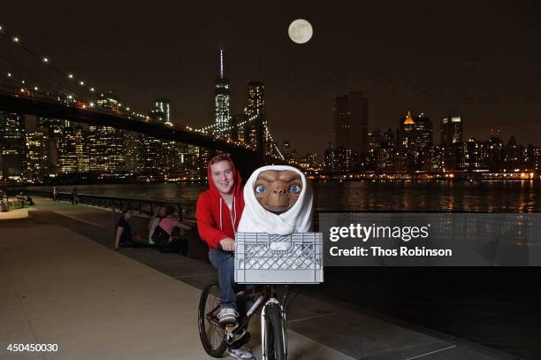 Studio artist rides E.T. Figure to its new home in the film experience at Madame Tussauds New York for the anniversary of Universal Studios/Amblin...