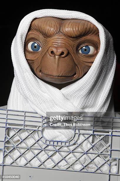 Studio artist rides E.T. Figure to its new home in the film experience at Madame Tussauds New York for the anniversary of Universal Studios/Amblin...