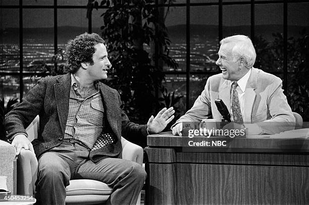 Pictured: Actor Albert Brooks during an interview with host Johnny Carson on May 17, 1983--