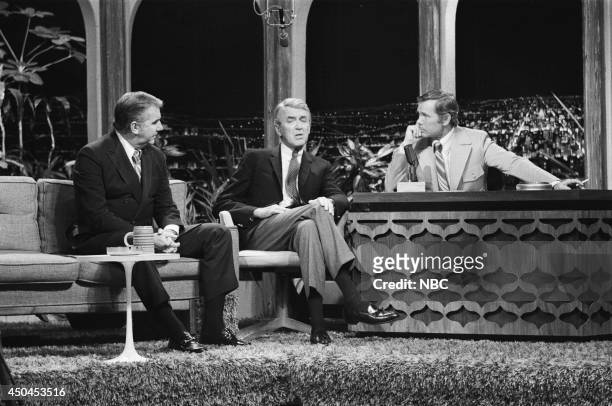 Pictured: Announcer Ed McMahon and actor James Stewart during an interview with host Johnny Carson on November 25, 1970 --