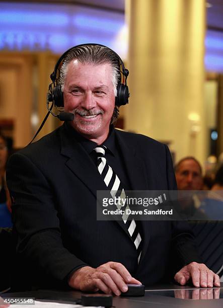 Network Live show host Barry Melrose smiles before Game Three of the 2014 Stanley Cup Final between the New York Rangers and the Los Angeles Kings at...