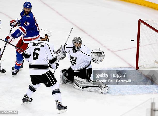 Benoit Pouliot of the New York Rangers scores on Jonathan Quick of the Los Angeles Kings during the first period of Game Four of the 2014 NHL Stanley...