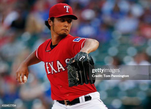 Yu Darvish of the Texas Rangers pitches against the Miami Marlins in the top of the first inning at Globe Life Park in Arlington on June 11, 2014 in...