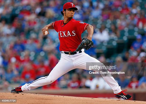 Yu Darvish of the Texas Rangers pitches against the Miami Marlins in the top of the first inning at Globe Life Park in Arlington on June 11, 2014 in...