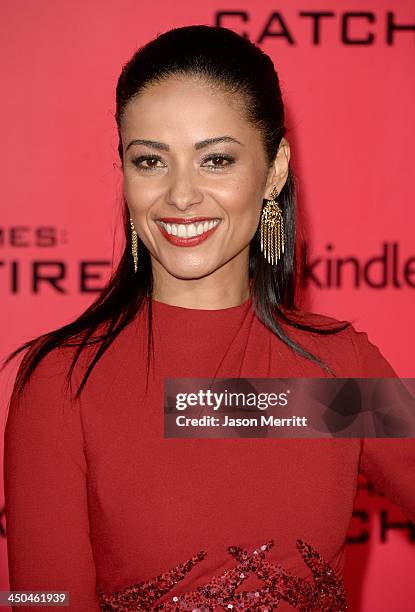 Actress Meta Golding arrives at the premiere of Lionsgate's "The Hunger Games: Catching Fire" at Nokia Theatre L.A. Live on November 18, 2013 in Los...