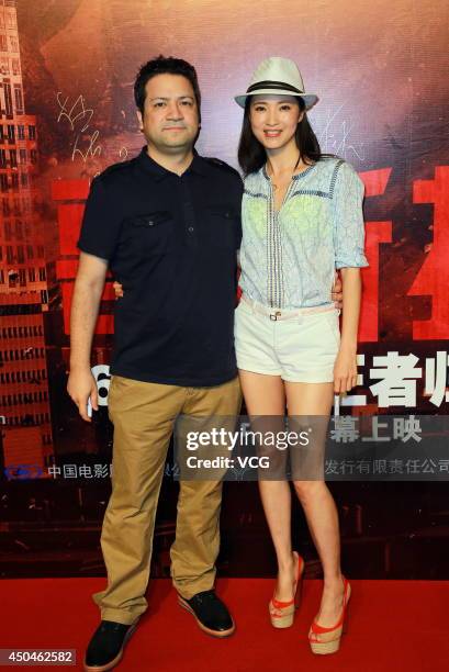 Actress Gong Beibi and her husband director Dayyan Eng attend "Godzilla" premiere on June 11, 2014 in Beijing, China.