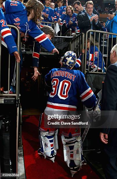 Goaltender Henrik Lundqvist of the New York Rangers leaves the ice after his team defeated the Los Angeles Kings 2-1 in Game Four of the 2014 Stanley...