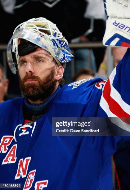 Goaltender Henrik Lundqvist of the New York Rangers acknowledges the crowd after his team defeated the Los Angeles Kings 2-1 in Game Four of the 2014...