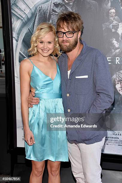 Actors Alison Pill and Josh Leonard attend the opening night premiere of "Snowpiercer" during the 2014 Los Angeles Film Festival at Regal Cinemas...