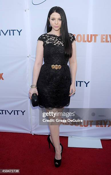 Actress Michelle Trachtenberg arrives at the Pathway To The Cures For Breast Cancer event at Barkar Hangar on June 11, 2014 in Santa Monica,...