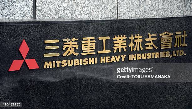 The logo outside the headquarters of Japan corporation Mitsubishi Heavy Industries is pictured in Tokyo on June 12, 2014. Mitsubishi Heavy Industries...